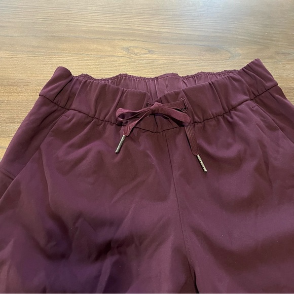 Lululemon On The Fly 7/8 Pant in Cassis Maroon size 4 - Picture 7 of 8